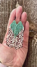 Load and play video in Gallery viewer, Turquoise and Cow Pattern Print Brown Cream Beaded Fringe Earrings